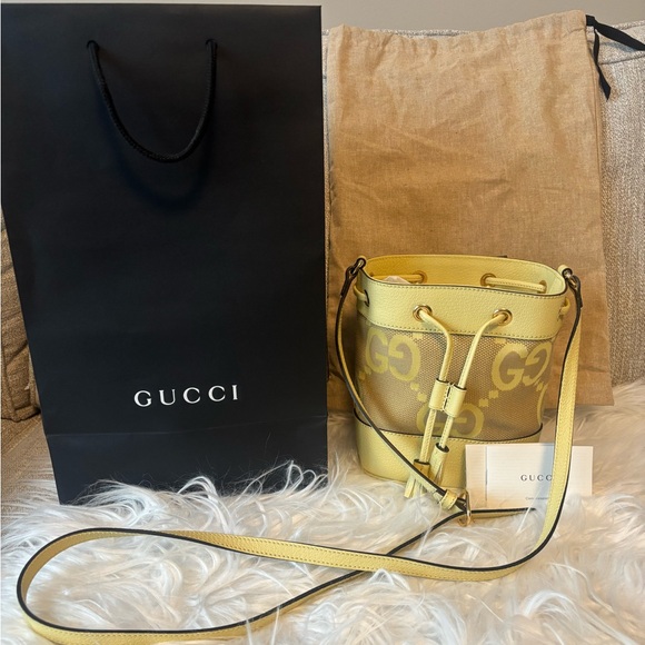 Gucci Handbags - Gucci jumbo GG mini bucket shoulder/crossbody bag